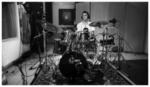 A drummer recording